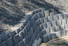 How Retaining Walls Help with Foundation Protection and Soil Stability